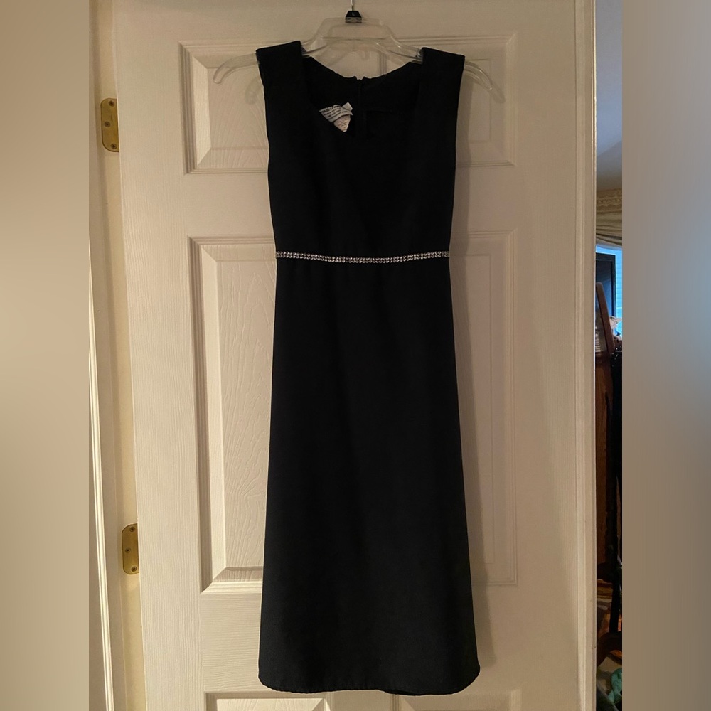 Elegant Black Dress with Embellished Waist